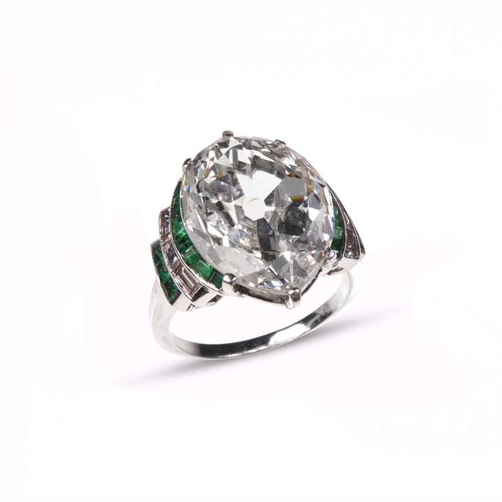 Single stone marquise diamond, emerald and diamond ring